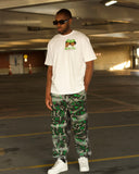 Front view of model wearing the North Bioko Club Members Only T-shirt with Black Washed 5X graffiti joggers