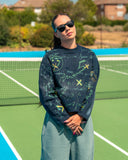 Model wearing the North Bioko Club 5X Graffiti Sweatshirt in Navy on a tennis court