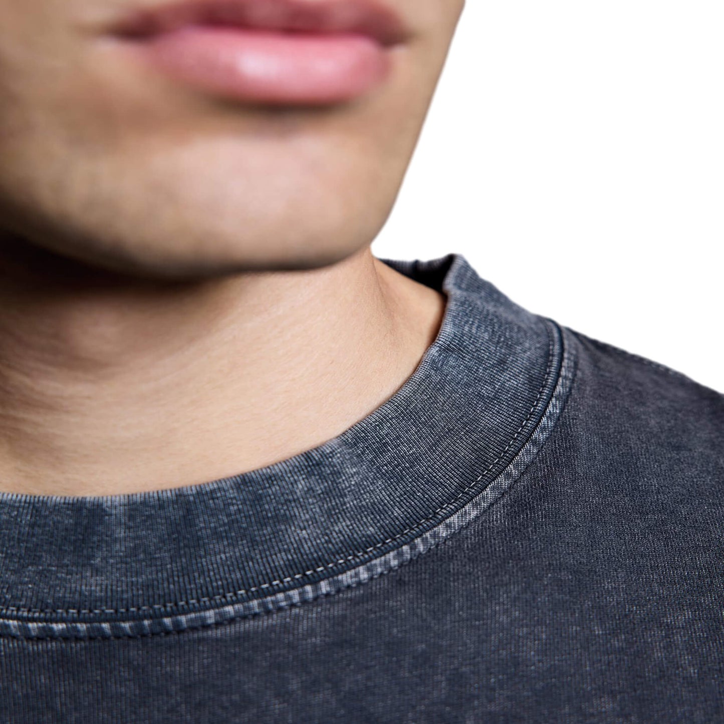 Close-up of black North Bioko Club heavyweight t-shirt showing ribbed collar and stitching
