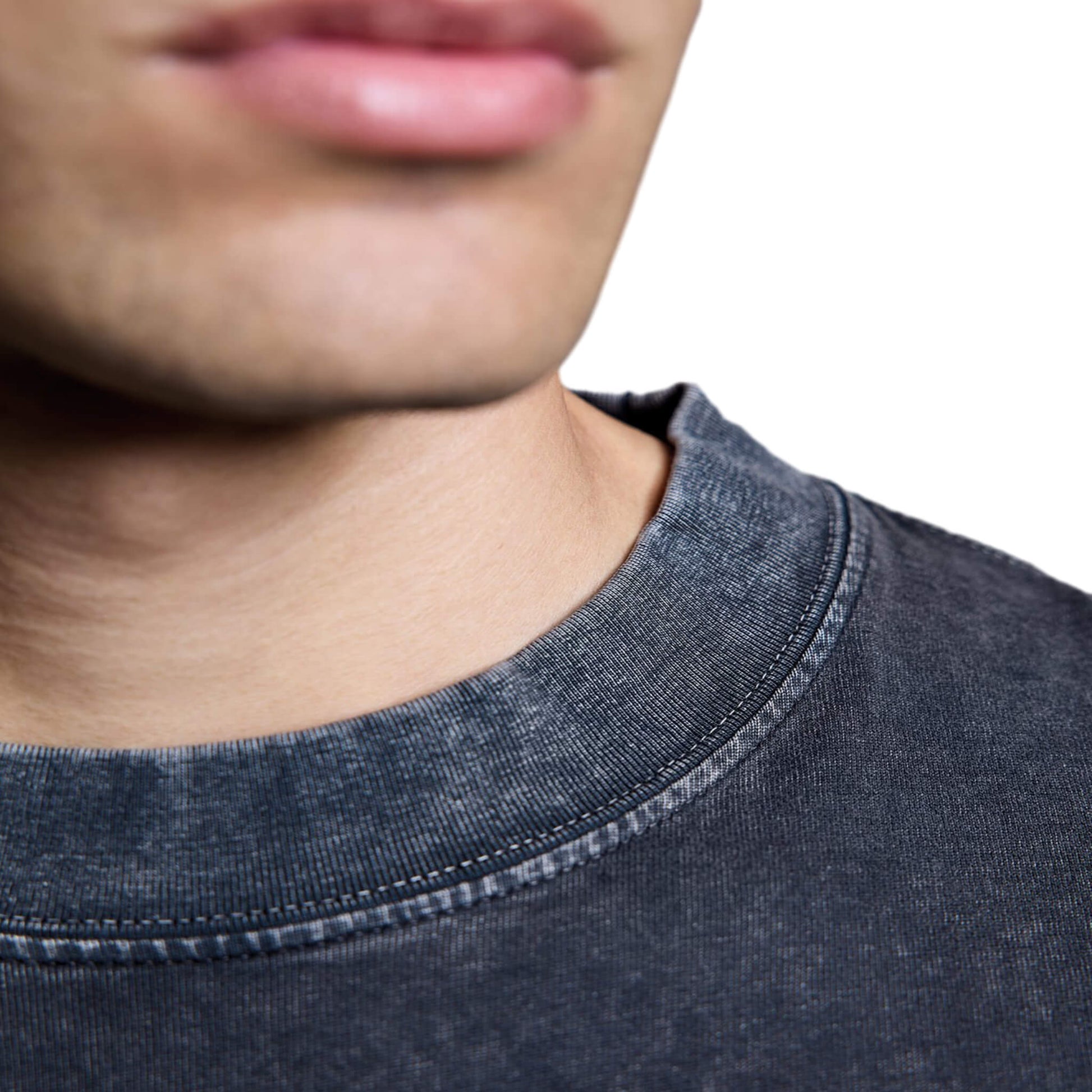 Close-up of black North Bioko Club heavyweight t-shirt showing ribbed collar and stitching