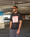 Model wearing North Bioko Club heavyweight black graphic T-shirt with red NORTH artwork