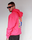 North Bioko Club Peach Hoodie in Hibiscus Pink from rear angle showing oversized fit and back graphic