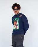 Three-quarter view of THE MUSE navy sweatshirt showing green portrait frame, raw hem and boxy silhouette