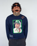 Close front view of THE MUSE sweatshirt in navy showing portrait artwork, green border and shoulder distressing