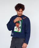 Front detail of THE MUSE navy sweatshirt showing portrait graphic and distressed shoulder cuts
